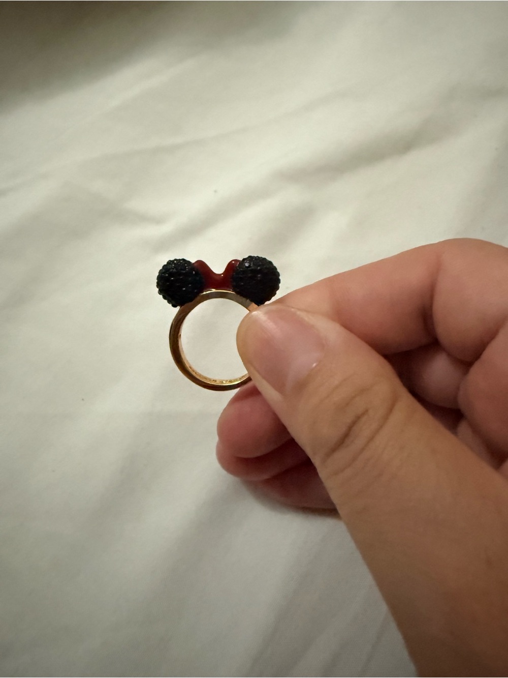 kate spade Gold-Tone Ring with Black Beaded Bows and Red Accent